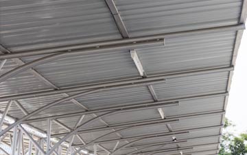 installing Fence Houses metal roofing